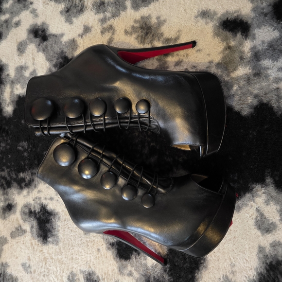 Christian Louboutin Black Heeled Boots with Red Soles